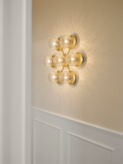 Liila Star optic clear wandlamp Nuura 